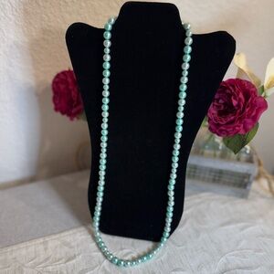 Light blue faux pearl one strand necklace. 10mm‎ and 8mm beads. 17 1/2” long
